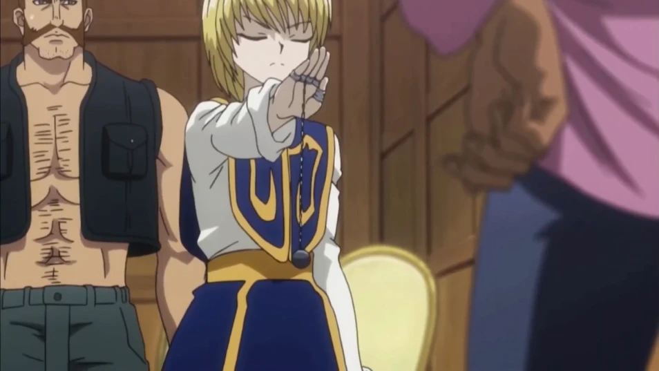 Kurapika using the Dowsing Chain in an interrogation