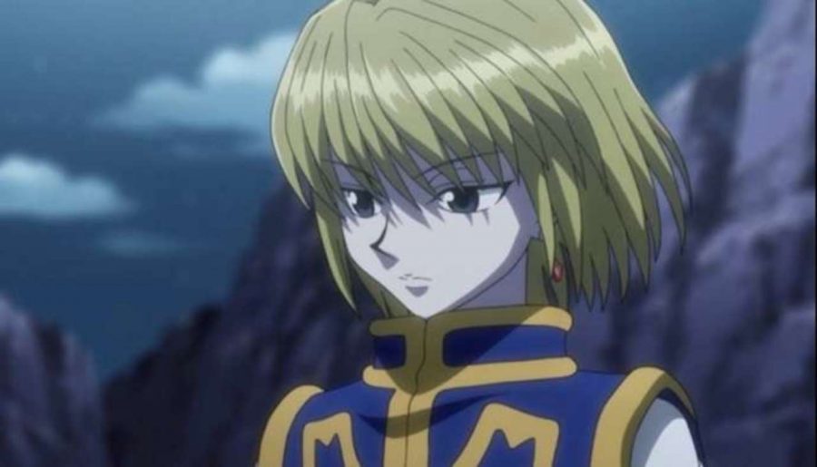 Kurapika with a neutral expression and wind blowing his hair