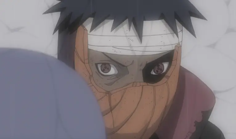 Obito Uchiha with his Tobi mask half-broken after using Izanagi.